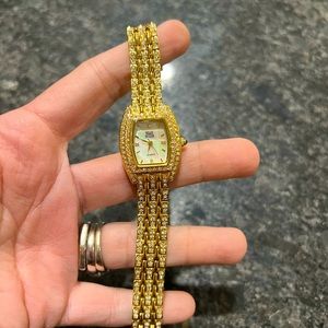 Nolan Miller gold diamonique watch